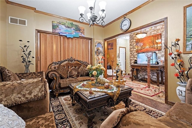 living area featuring crown molding, a chandelier, carpet flooring, and visible vents
