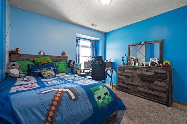 carpeted bedroom featuring visible vents and a textured ceiling