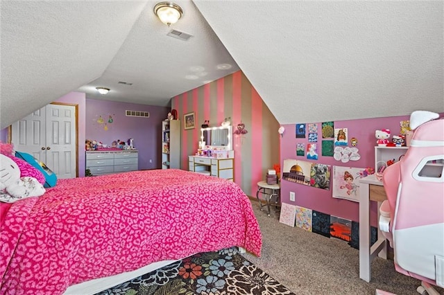 carpeted bedroom featuring visible vents, a textured ceiling, and lofted ceiling