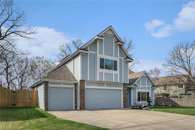 401 NW 51st St, Gladstone, MO 64118 - tudor home featuring brick siding, concrete driveway, an attached garage, and a shingled roof