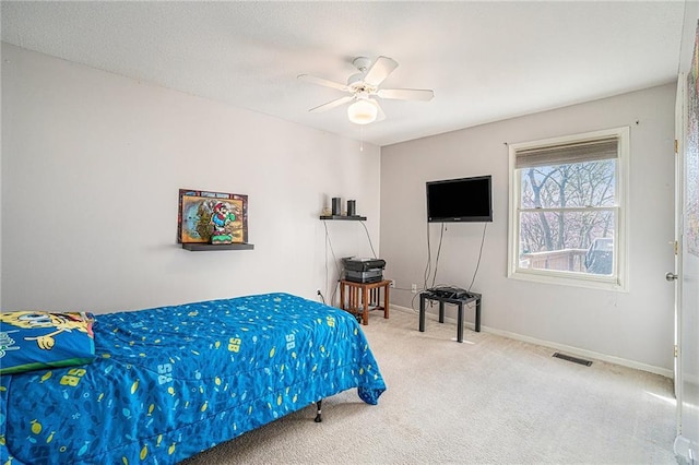 401 NW 51st St, Gladstone, MO 64118 - bedroom with carpet, baseboards, and a ceiling fan
