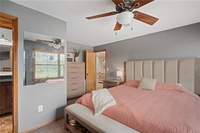 2102 W Dennis Ave, Olathe, KS 66061 - bedroom with carpet flooring, ceiling fan, and baseboards