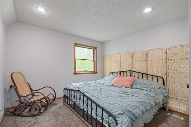 2102 W Dennis Ave, Olathe, KS 66061 - bedroom with visible vents, carpet floors, baseboards, a textured ceiling, and vaulted ceiling
