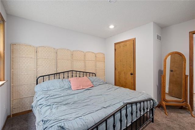 2102 W Dennis Ave, Olathe, KS 66061 - carpeted bedroom with visible vents, recessed lighting, and a textured ceiling