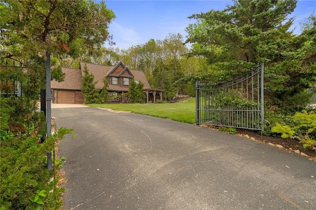 2102 W Dennis Ave, Olathe, KS 66061 - exterior space with a gated entry, a gate, and aphalt driveway