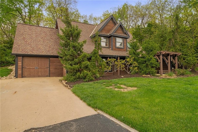 2102 W Dennis Ave, Olathe, KS 66061 - view of front of house with a garage, stairway, a front lawn, concrete driveway, and a shingled roof