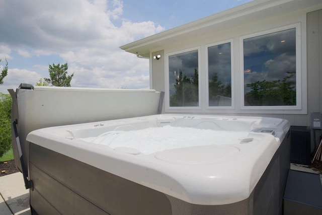 10300 W 174th St, Overland Park, KS 66221 - view of patio / terrace featuring a hot tub