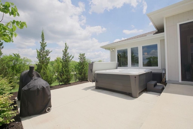 10300 W 174th St, Overland Park, KS 66221 - view of patio / terrace featuring a hot tub