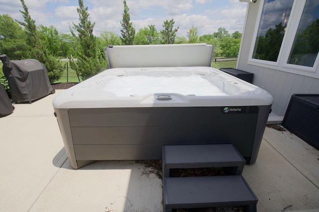 10300 W 174th St, Overland Park, KS 66221 - view of patio / terrace with a hot tub