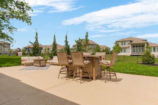 10300 W 174th St, Overland Park, KS 66221 - view of patio / terrace with a residential view, outdoor lounge area, and a playground