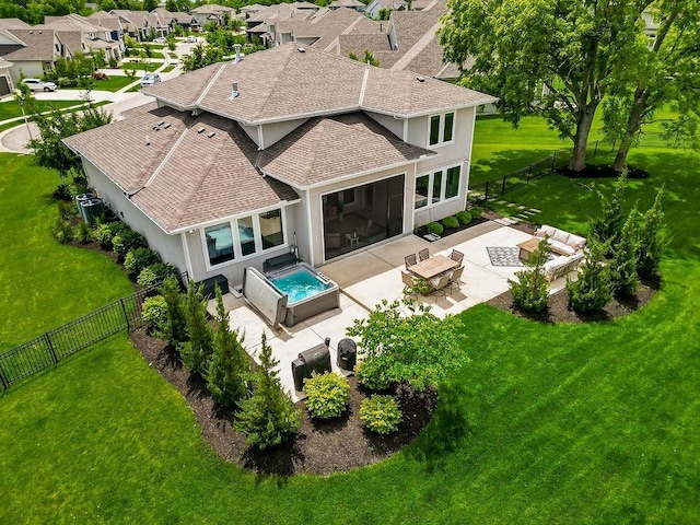 10300 W 174th St, Overland Park, KS 66221 - rear view of house featuring a patio, stucco siding, a residential view, an outdoor hangout area, and a shingled roof