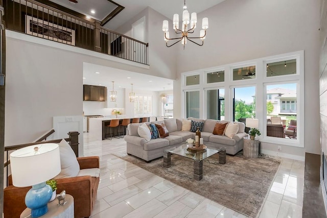 10300 W 174th St, Overland Park, KS 66221 - living area featuring a chandelier and a high ceiling