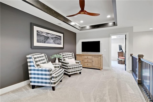 10300 W 174th St, Overland Park, KS 66221 - living area featuring recessed lighting, light carpet, a ceiling fan, baseboards, and a raised ceiling