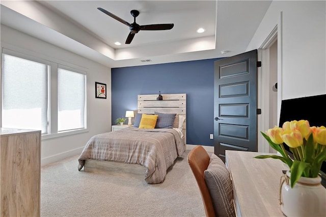 10300 W 174th St, Overland Park, KS 66221 - carpeted bedroom featuring baseboards, a tray ceiling, recessed lighting, and a ceiling fan