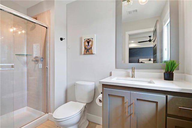 10300 W 174th St, Overland Park, KS 66221 - full bathroom with vanity, toilet, a stall shower, and baseboards