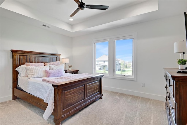 10300 W 174th St, Overland Park, KS 66221 - bedroom featuring light carpet, baseboards, a raised ceiling, recessed lighting, and ceiling fan