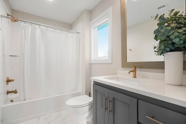 10300 W 174th St, Overland Park, KS 66221 - bathroom with vanity, marble finish floors, toilet, and shower / tub combo