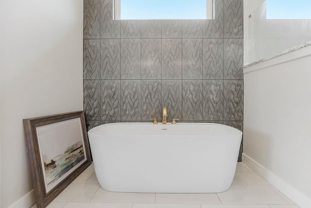 10300 W 174th St, Overland Park, KS 66221 - full bathroom featuring a soaking tub, plenty of natural light, and tile patterned floors