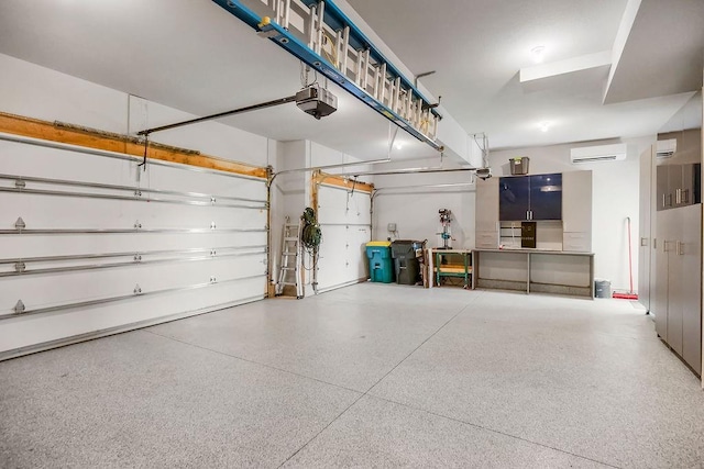 10300 W 174th St, Overland Park, KS 66221 - garage with a wall mounted AC and a garage door opener