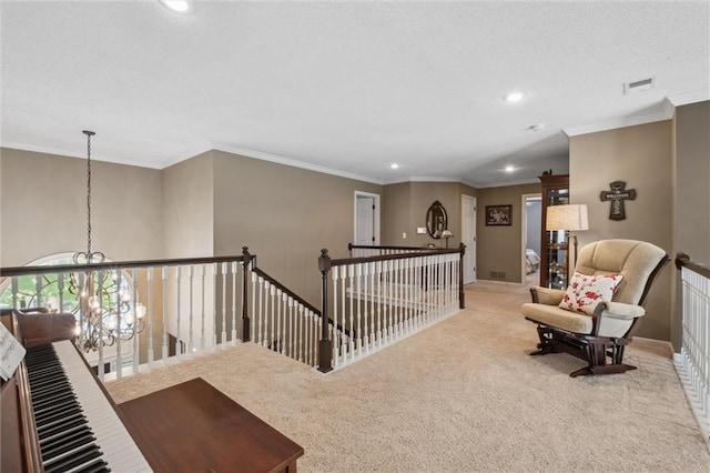 living area featuring visible vents, carpet flooring, recessed lighting, and a chandelier