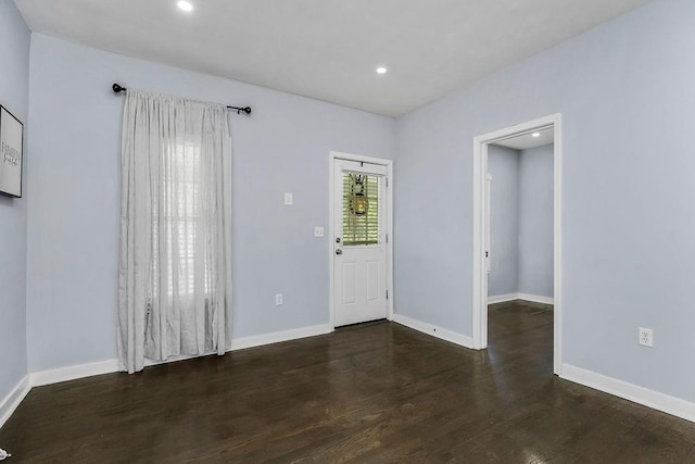 3075 N 31st St, Kansas City, KS 66104 - foyer entrance with baseboards, wood finished floors, and recessed lighting