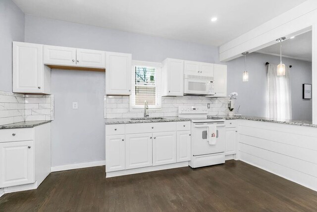 3075 N 31st St, Kansas City, KS 66104 - kitchen featuring light stone counters, a sink, white appliances, backsplash, and dark wood-type flooring