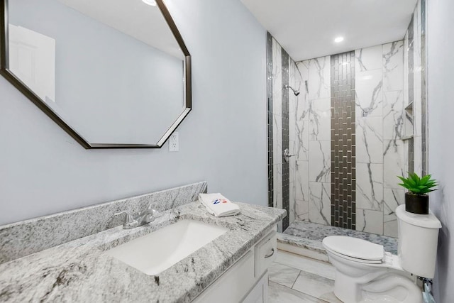 3075 N 31st St, Kansas City, KS 66104 - bathroom with recessed lighting, a shower stall, marble finish floor, toilet, and vanity