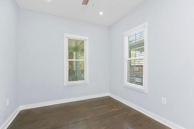 3075 N 31st St, Kansas City, KS 66104 - unfurnished room with dark wood finished floors, baseboards, ceiling fan, and recessed lighting