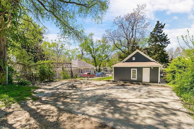 3075 N 31st St, Kansas City, KS 66104 - exterior space with an outdoor structure and fence