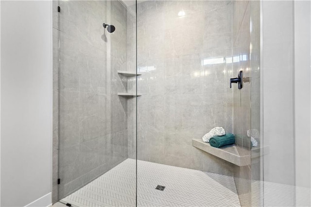 bathroom with a shower stall