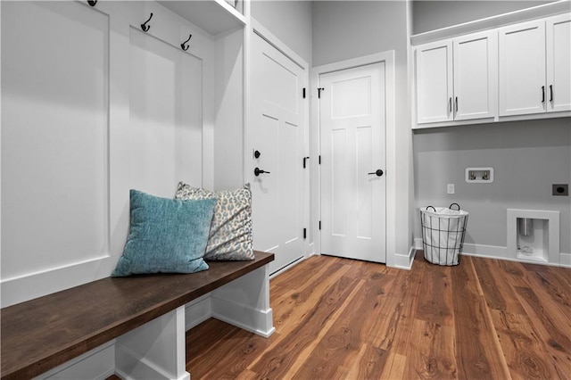 mudroom featuring wood finished floors and baseboards