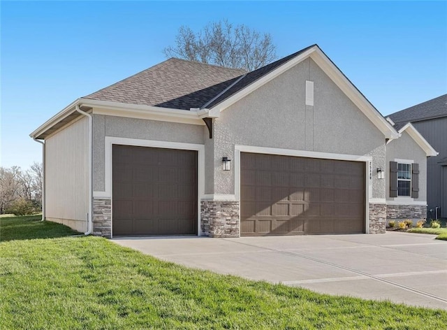 view of front of property featuring stucco siding, an attached garage, and stone siding