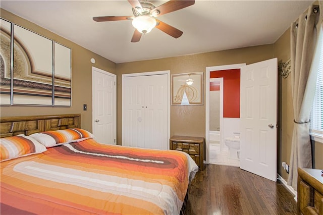 bedroom featuring ceiling fan, ensuite bath, and dark wood finished floors