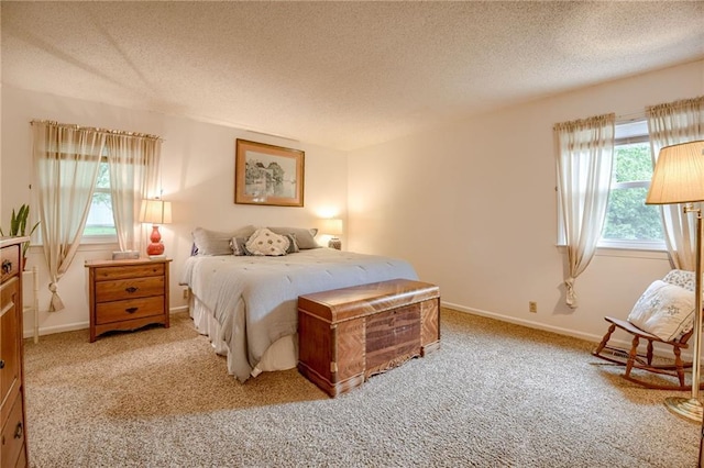 763 J Hwy, Peculiar, MO 64078 - bedroom featuring a textured ceiling, light colored carpet, and baseboards