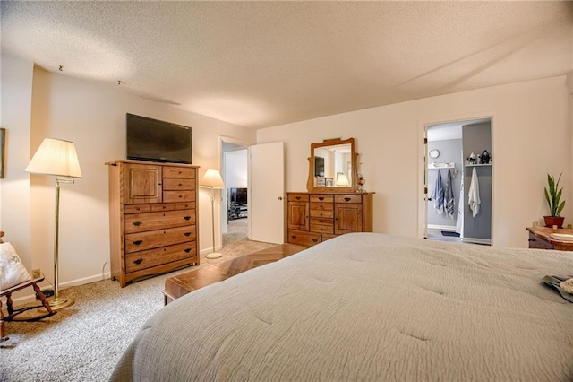 763 J Hwy, Peculiar, MO 64078 - carpeted bedroom with baseboards and a textured ceiling