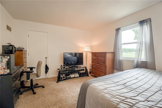 763 J Hwy, Peculiar, MO 64078 - carpeted bedroom with an office area