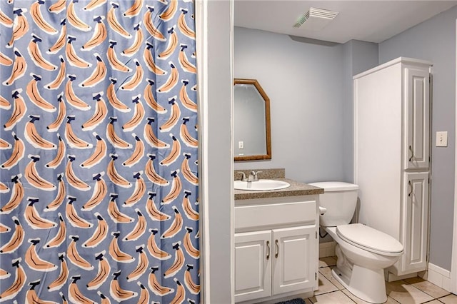 763 J Hwy, Peculiar, MO 64078 - full bath featuring toilet, vanity, and tile patterned floors