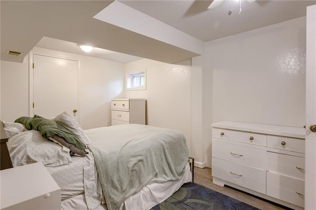 763 J Hwy, Peculiar, MO 64078 - bedroom with a ceiling fan, baseboards, and wood finished floors