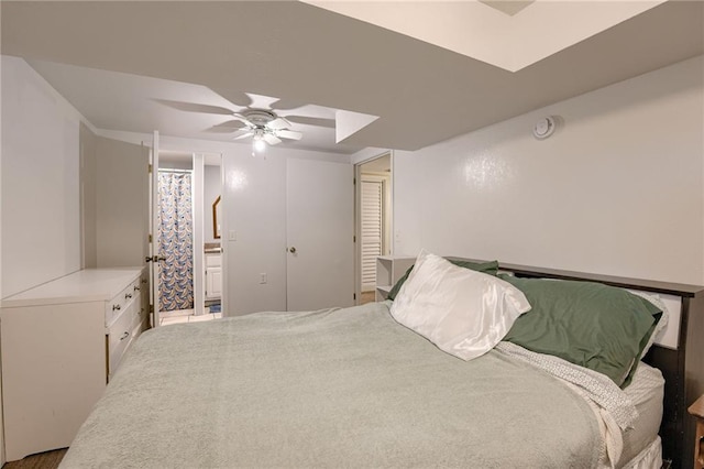 763 J Hwy, Peculiar, MO 64078 - bedroom featuring connected bathroom and ceiling fan