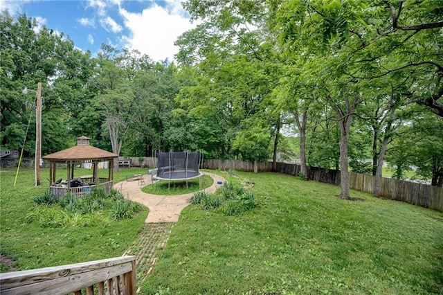 763 J Hwy, Peculiar, MO 64078 - view of yard with a trampoline and a gazebo