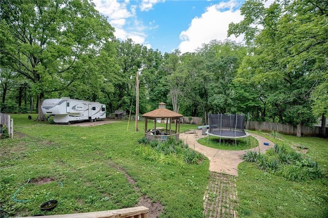 763 J Hwy, Peculiar, MO 64078 - view of yard with a gazebo and a trampoline