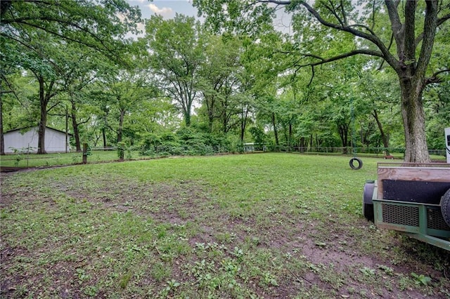 763 J Hwy, Peculiar, MO 64078 - view of yard featuring view of wooded area
