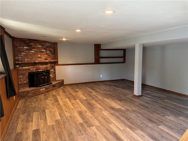 3804 S Drumm Ave, Independence, MO 64055 - finished basement featuring recessed lighting, wood finished floors, and baseboards