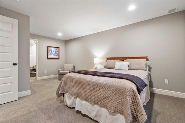 bedroom featuring visible vents, baseboards, recessed lighting, and light colored carpet