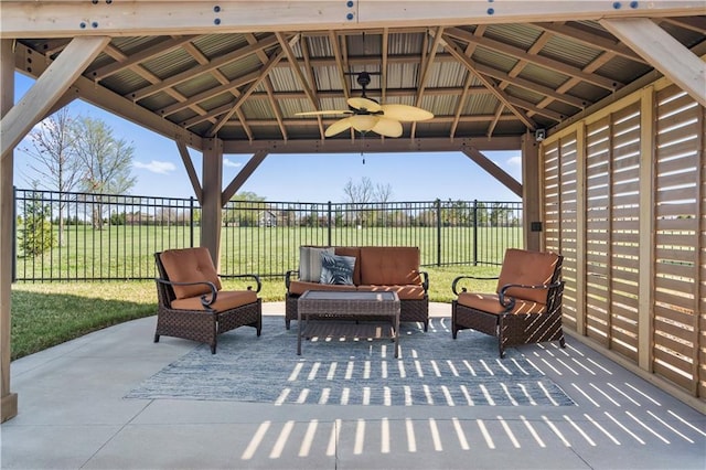 view of patio / terrace with outdoor lounge area, a gazebo, and fence