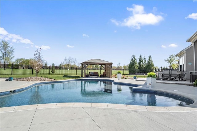 view of pool with a patio, a gazebo, a fenced in pool, and fence