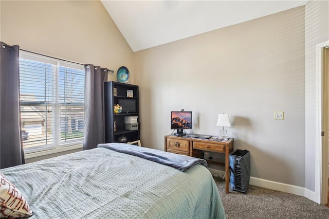 carpeted bedroom featuring baseboards and vaulted ceiling