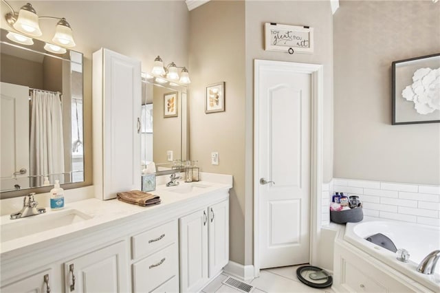bathroom featuring tile patterned flooring, a sink, a bath, and double vanity