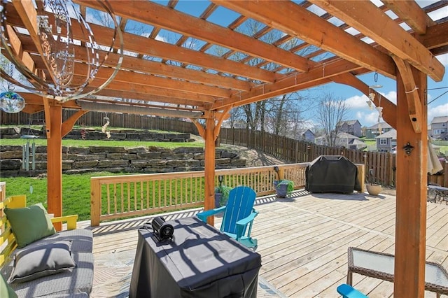 wooden terrace with a fenced backyard, a yard, and a pergola