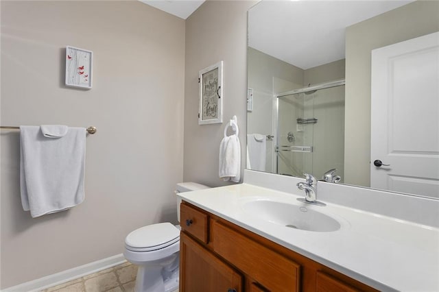 2118 NE 107th Ter, Kansas City, MO 64155 - bathroom featuring toilet, vanity, baseboards, and a stall shower